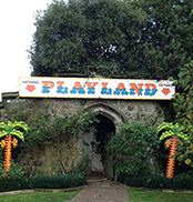 illuminated 'playland' sign